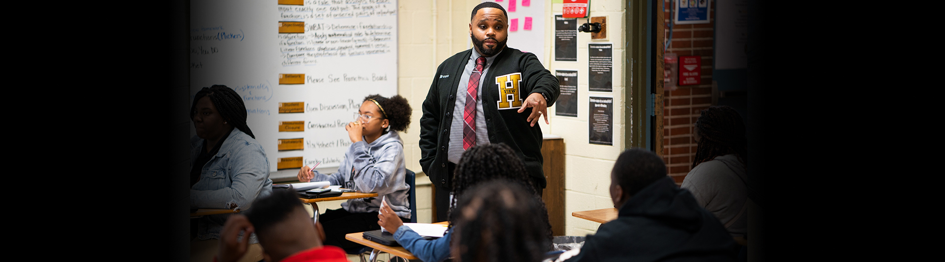 SCS Teacher in classroom teaching to students.