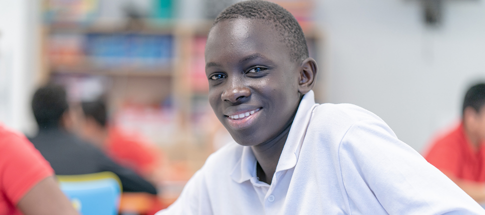 Another school boy smiling