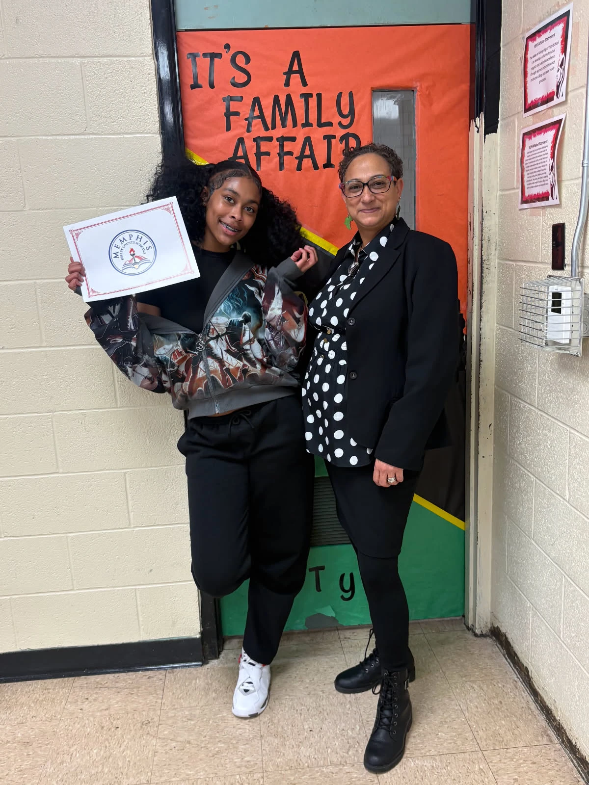 Staff member supporting a student